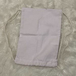 White cloth wine bottle pouch, side drawstring straps